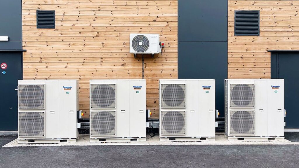 Four air source heat pumps provide heating, cooling and hot water